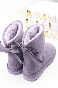 冬季新品韩国蝴蝶结可爱雪地靴女中筒靴牛皮毛毛靴平跟加厚女棉鞋